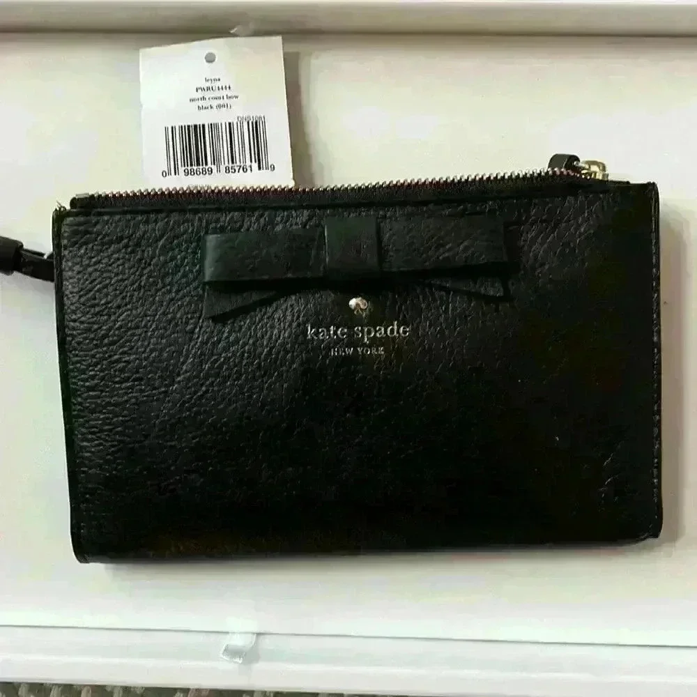 Vintage new with tags Kate Spade north court bow wristlet in black
